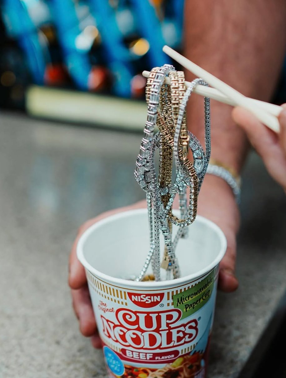 Diamond bracelets presented with chopsticks